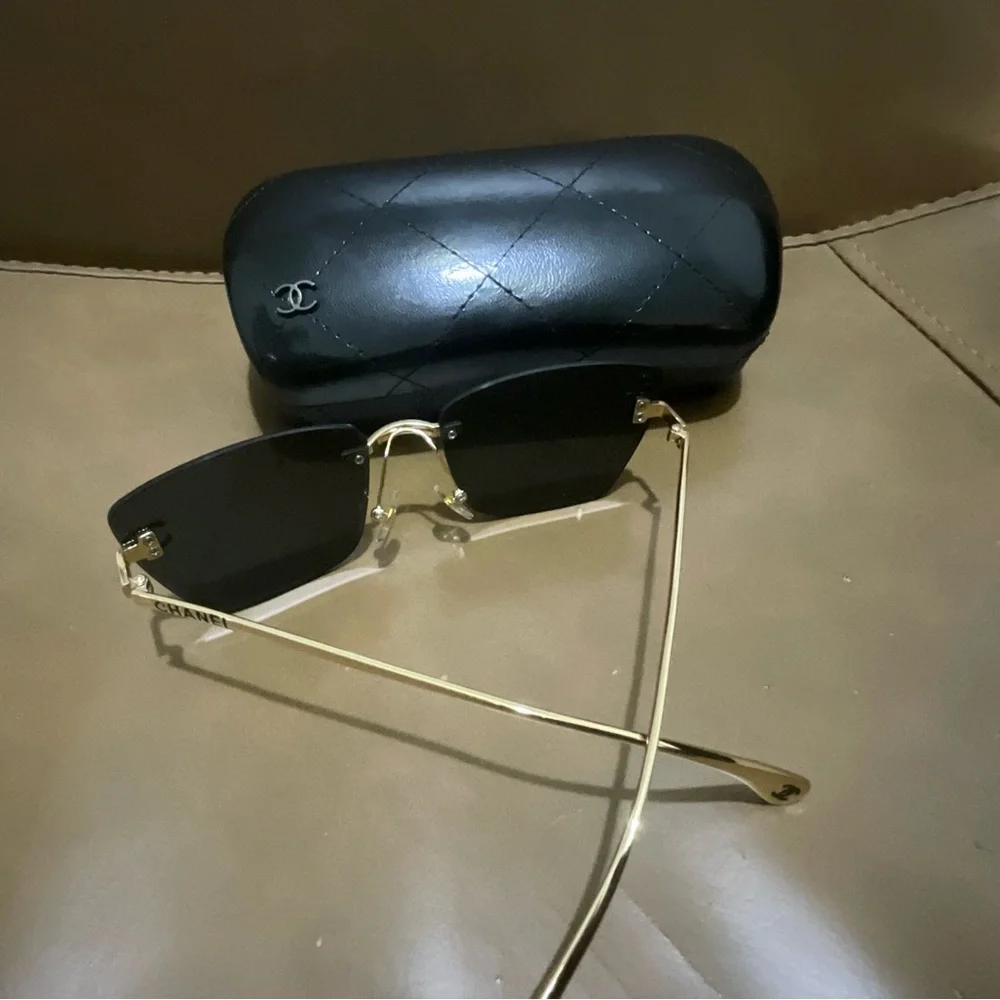 Chanel Women’s Black and Gold Sunglasses